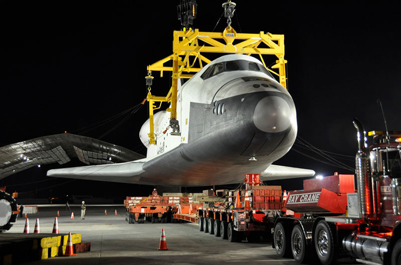 Space shuttle Enterprise hoisted off jumbo jet in New York