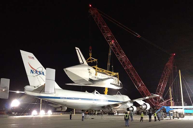 Shuttle Endeavour hoisted off jet for road trip to L.A. museum