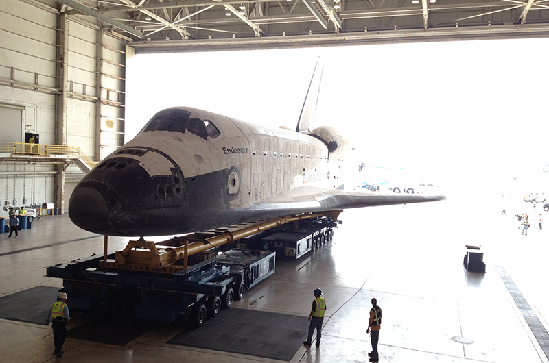 Shuttle Endeavour hoisted off jet for road trip to L.A. museum